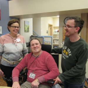 Full Life Care Nurse’s Aide Joyce O’Malley laughs with clients Todd and Tim.